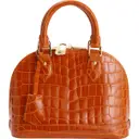 Alma crocodile handbag Louis Vuitton