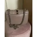 Buy Valentino Garavani Glam Lock leather handbag online