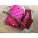 Buy Valentino Garavani Rockstud spike leather mini bag online
