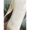 Buy Miu Miu Patent leather sandals online