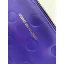 Buy Comme Des Garcons Leather clutch bag online