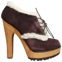 Shearling lace up boots Dolce & Gabbana