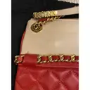 Leather clutch bag Moschino