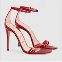 Buy Gucci Patent leather sandals online