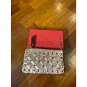 Buy Valentino Garavani Rockstud leather purse online