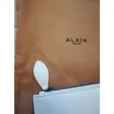 Buy Alaïa Leather clutch bag online