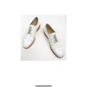 Buy Gucci Patent leather lace ups online