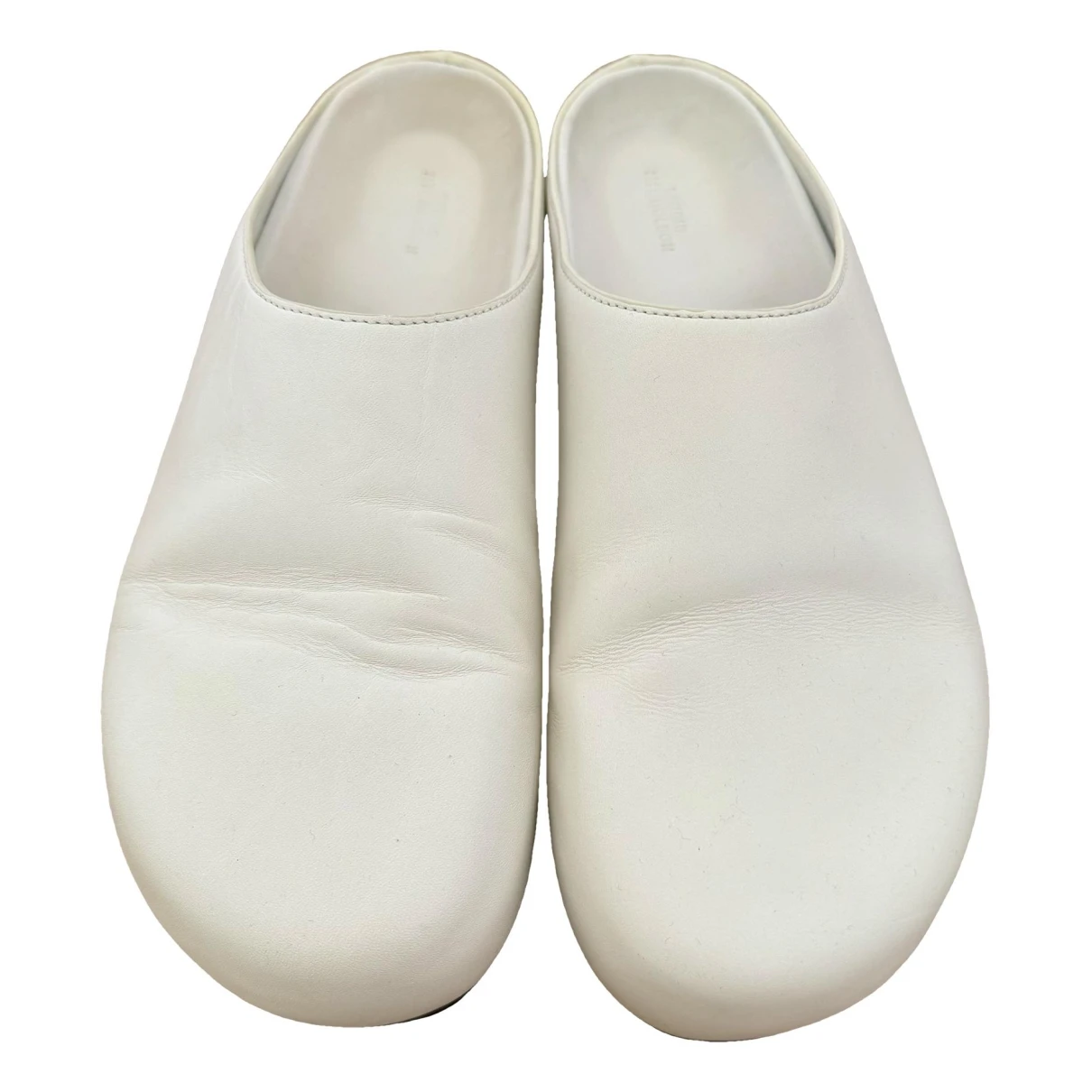 Pre-owned Studio Nicholson Leather Mules & Clogs In White