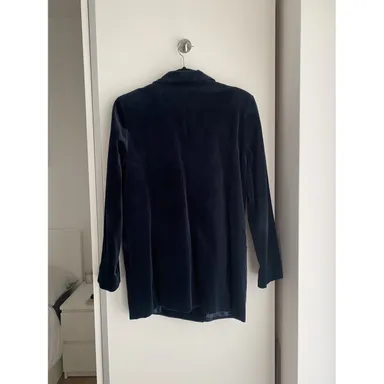 https://images.vestiairecollective.com/images/resized/w=384,q=80,f=auto,/produit/blue-cotton-ganni-jacket-30361245-3_2.jpg?secret=VC-e9eee96a-a819-4431-ad12-d066be2626ef