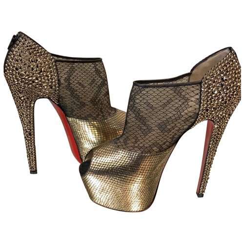 Pre-owned Christian Louboutin Python Open Toe Boots In Gold