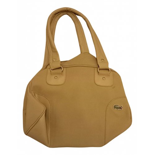 Pre-owned Lacoste Leather Handbag In Beige