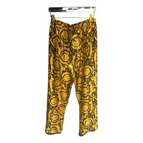Pre-owned Versace Silk Trousers In Yellow