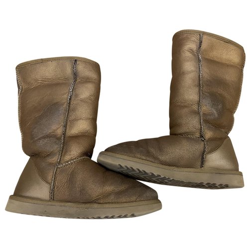 Pre-owned Ugg Leather Snow Boots In Gold