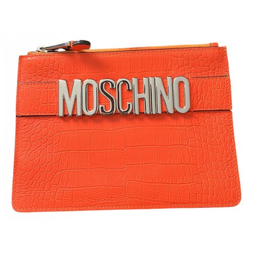Pre-owned Moschino Leather Clutch Bag In Orange